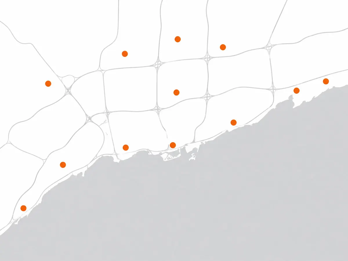 Illustrated map of the Greater Toronto Area along Lake Ontario with the 12 service cities marked in orange